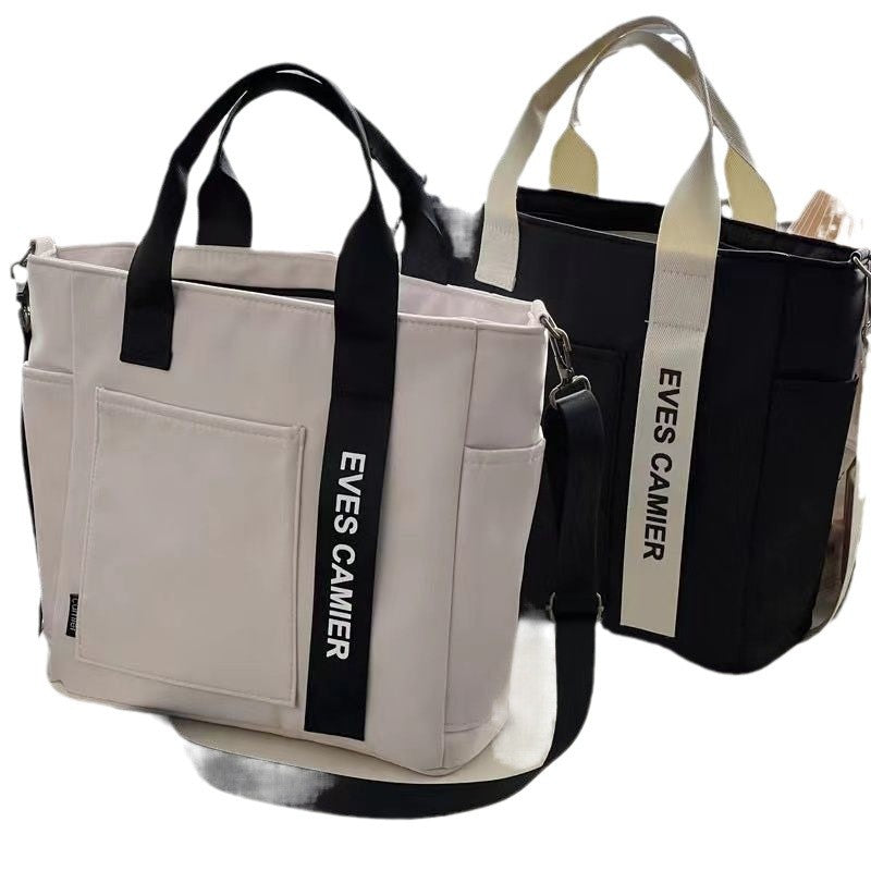 New Design Waterproof and Stylish Tote Canvas Hand Carry Messenger Bag Simple and Versatile Single Shoulder Portable Bento Lunch Box Bag