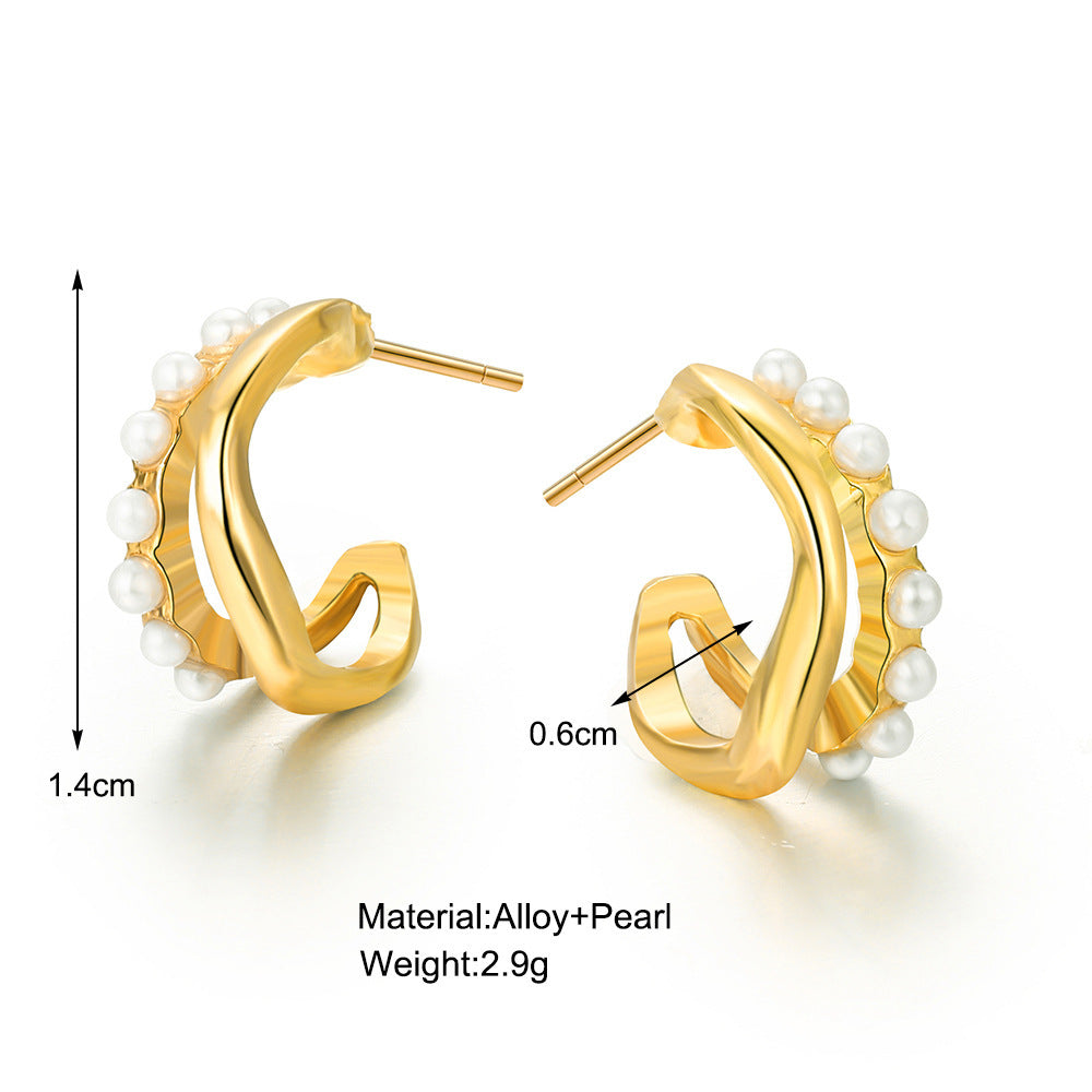 XP17 European and American hot-selling niche design sense retro pearl earrings creative unique metal stud earrings light luxury
