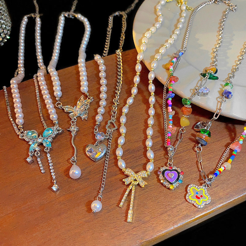 Korean New Pearl Butterfly Necklace Women's High-end Light Luxury Niche Versatile Sweater Chain Autumn and Winter Popular Accessories