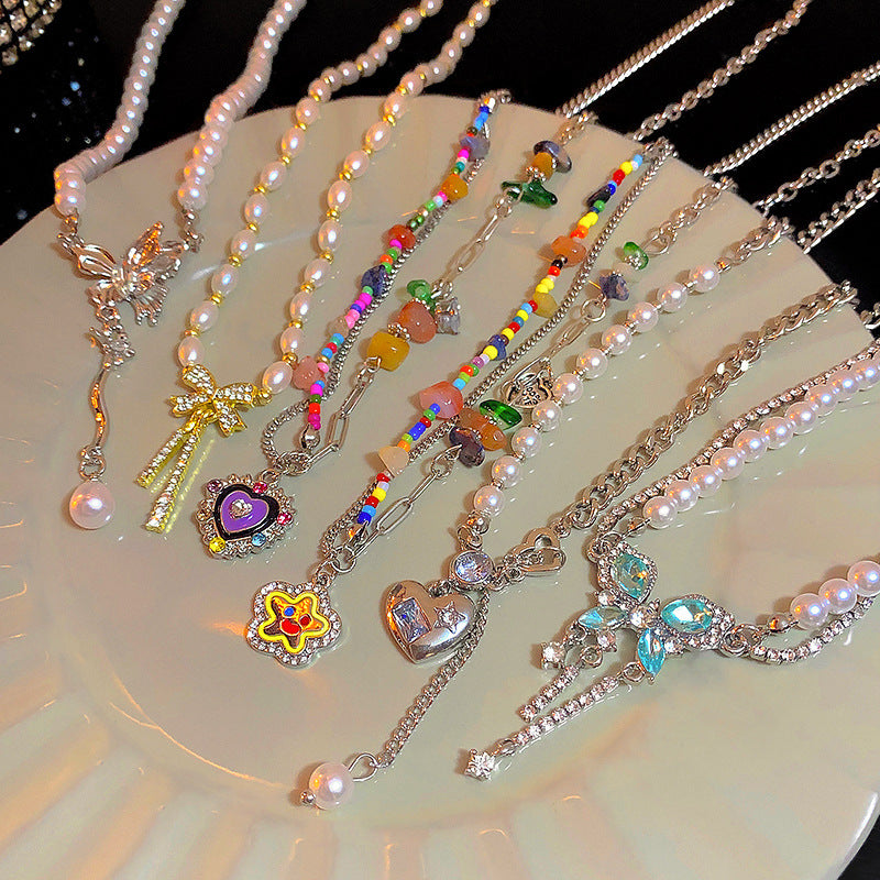 Korean New Pearl Butterfly Necklace Women's High-end Light Luxury Niche Versatile Sweater Chain Autumn and Winter Popular Accessories