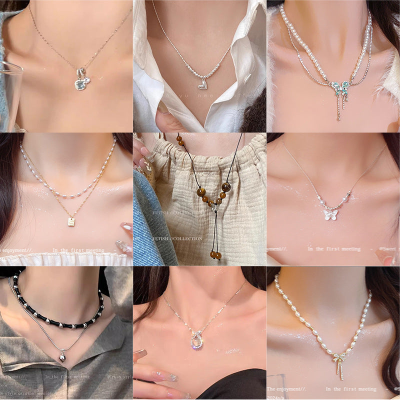 Korean New Pearl Butterfly Necklace Women's High-end Light Luxury Niche Versatile Sweater Chain Autumn and Winter Popular Accessories