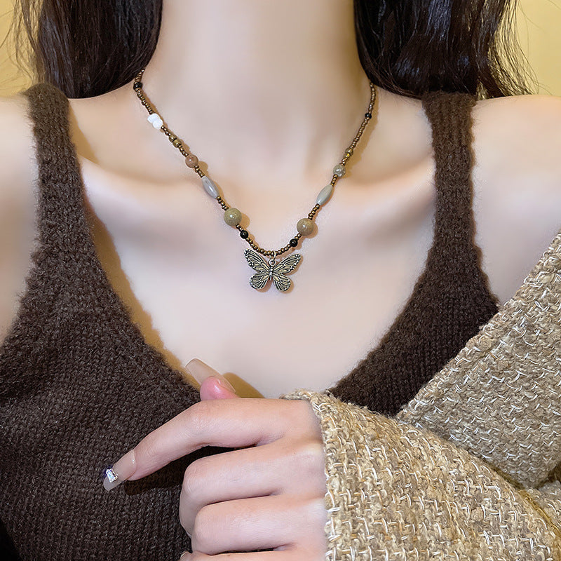 Korean New Pearl Butterfly Necklace Women's High-end Light Luxury Niche Versatile Sweater Chain Autumn and Winter Popular Accessories
