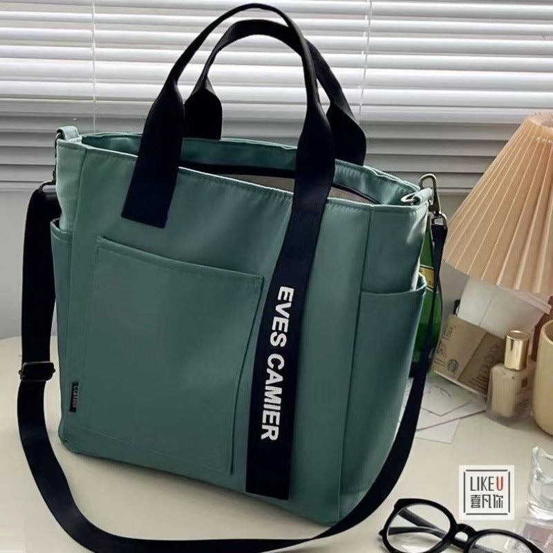 New Design Waterproof and Stylish Tote Canvas Hand Carry Messenger Bag Simple and Versatile Single Shoulder Portable Bento Lunch Box Bag