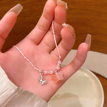 Korean New Pearl Butterfly Necklace Women's High-end Light Luxury Niche Versatile Sweater Chain Autumn and Winter Popular Accessories