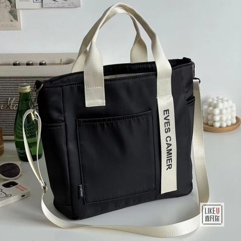 New Design Waterproof and Stylish Tote Canvas Hand Carry Messenger Bag Simple and Versatile Single Shoulder Portable Bento Lunch Box Bag