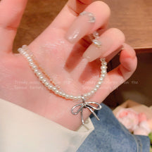 Korean New Pearl Butterfly Necklace Women's High-end Light Luxury Niche Versatile Sweater Chain Autumn and Winter Popular Accessories