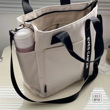 New Design Waterproof and Stylish Tote Canvas Hand Carry Messenger Bag Simple and Versatile Single Shoulder Portable Bento Lunch Box Bag